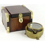 A Second World War aviation compass, type P11, liquid filled in a brass casing, 14cm dia. in an