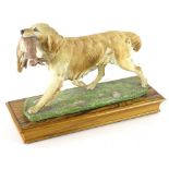 An Albany porcelain figure of a golden retriever, modelled by Neil Campbell, limited edition, on a