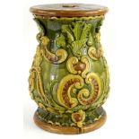 A Majolica pottery jardiniere stand, with a pierced top, moulded with masks, scrolls etc., unmarked,