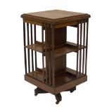 A late Victorian revolving bookcase, 88cm H, 50cm Sq.