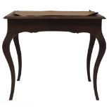 A 19thC French walnut writing table, with serpentine moulded top, shaped frieze drawer, and square