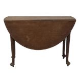 A George III mahogany gateleg table, with oval dropleaf top, on four turned legs with club feet