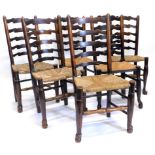 A Harlequin set of six Lancashire ash ladder back chairs, each with a rush seat on turned legs