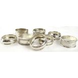Various silver napkin rings etc., to include some matching pieces. (8)