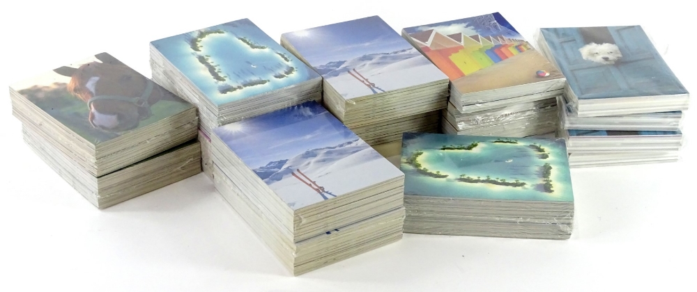 A large quantity of coloured postcards, various types, to include dogs, horses, beach scenes, skiing