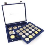 A collection of 32 various commemorative coins, to include five ten pound coins, six gold plated
