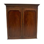 A George III flame mahogany cupboard, with moulded cornice over two ebony moulded panels doors,