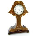 An Edwardian mahogany and marquetry mantel timepiece, modelled in the form of a stylised tree, the