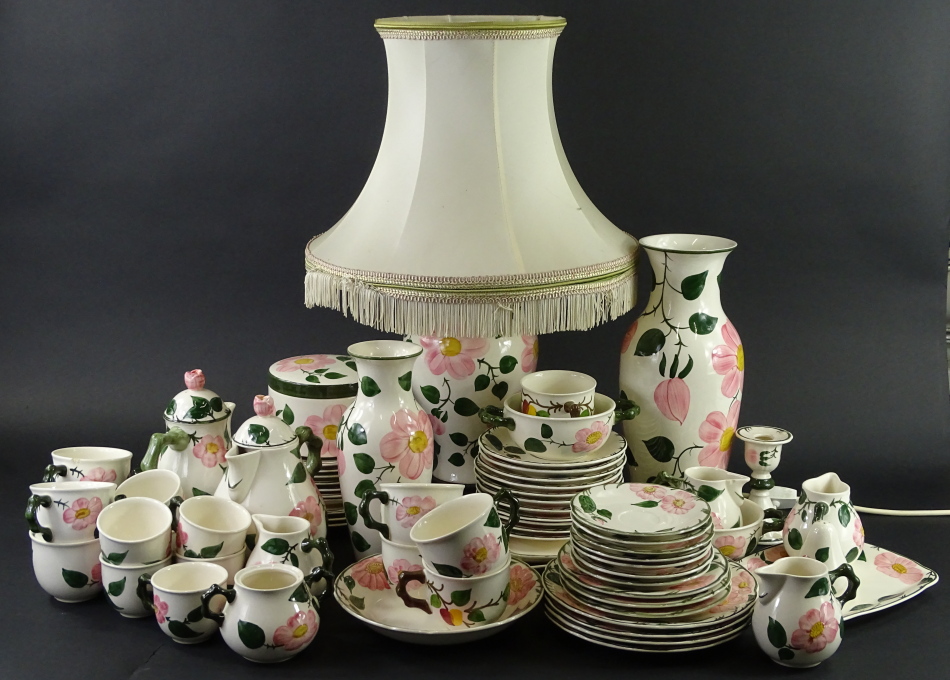 A Mettlach Wild Rose pattern part tea and dinner service etc., to include vases, lamp base, cups,