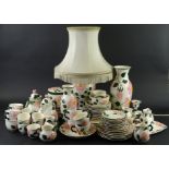 A Mettlach Wild Rose pattern part tea and dinner service etc., to include vases, lamp base, cups,