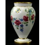 A McIntyre Florian design ware small vase, with tube lined decoration of swags of blue and red