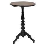 A 19thC Continental ebonised occasional table, the circular top with pokerwork decoration of