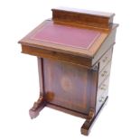 An Edwardian mahogany and satinwood crossbanded Davenport, the top with a hinged lid, above a fall