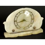 A 1950's alabaster and brass timepiece, with a shaped case, 18cm H.Provenance: This timepiece formed