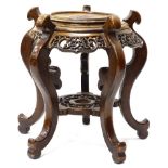 A 19thC hardwood jardiniere stand, with circular top on serpentine legs, with scroll feet, 57cm H,