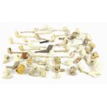 A large quantity of clay pipes, to include some novelty examples, etc. (some pieces AF)