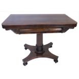 A William IV rosewood card table, the rectangular top with rounded corners above a cushion shaped