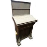 A late 19th/early 20thC oak lectern/collectors box, with a raised back, the slope front with a brass
