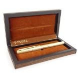 A Parker fountain pen, limited edition, made to commemorate the Royal Wedding 1981, in a wood effect