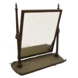 A 19thC mahogany dressing table mirror, with reeded supports enclosing a rectangular plate on a