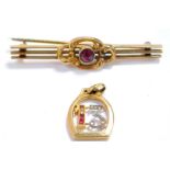 A ruby and diamond set No 13 pendant, set in Continental yellow metal, together with a Victorian