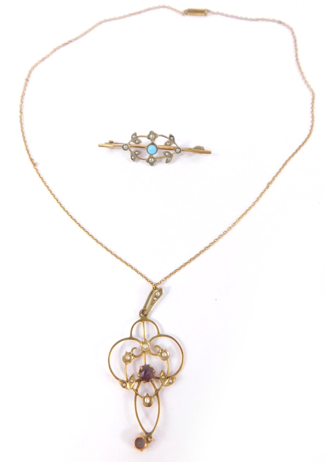 An Art Nouveau 9ct gold amethyst and seed pearl pendant on chain, together with a Victorian