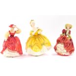 Three Royal Doulton porcelain figures, comprising The Last Waltz HN2315, Buttercup, red colourway,