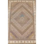 A Ghoochan rug, brown and cream banded, 185cm x 120cm.
