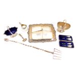 Silver plated wares, including a basket with embossed decoration, sugar basket, glass cream jug with