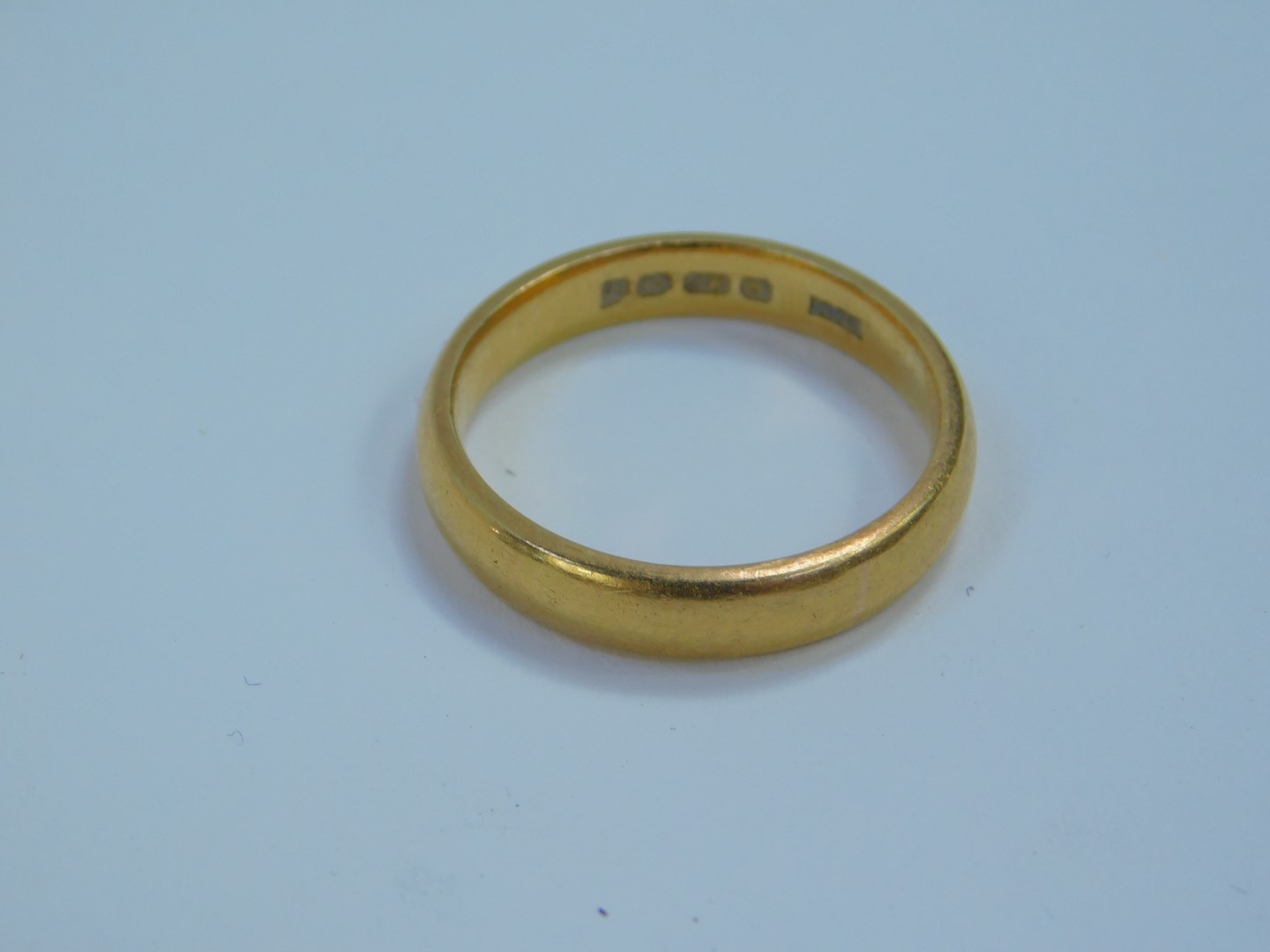 A 22ct gold wedding band, size M, 5.3g. - Image 2 of 2