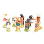 A Beswick pig band, boxed. (9)