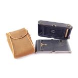 A Kodak Autographic No 3A folding pocket camera, cased, together with a Kodak portrait attachment No