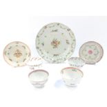 Four late 18thC Newhall porcelain tea bowls, decorated with flowers, two saucers, and a fluted
