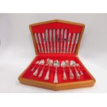 A Smith Seymour Limited silver plated half canteen of cutlery, decorated in the Kings pattern,