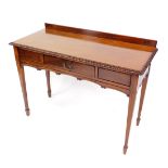 A Georgian style mahogany side table, with a gadrooned top, over a single frieze drawer, and