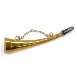 A late 19thC French brass hunting horn, impressed J Tournier, 4 Boulevard St Martin, Paris, 27cm L.