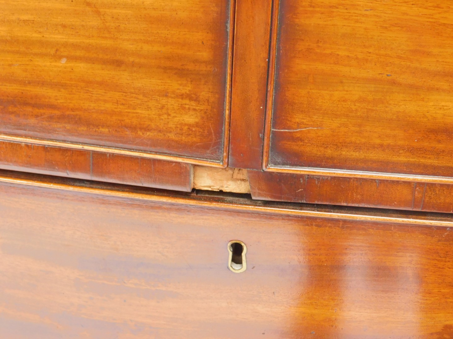 A George III mahogany bow front chest of drawers, of two short over three long drawers, raised on - Image 3 of 5