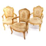 A pair of Victorian parcel gilt salon chairs, rococo style with tapestry overstuffed seat and