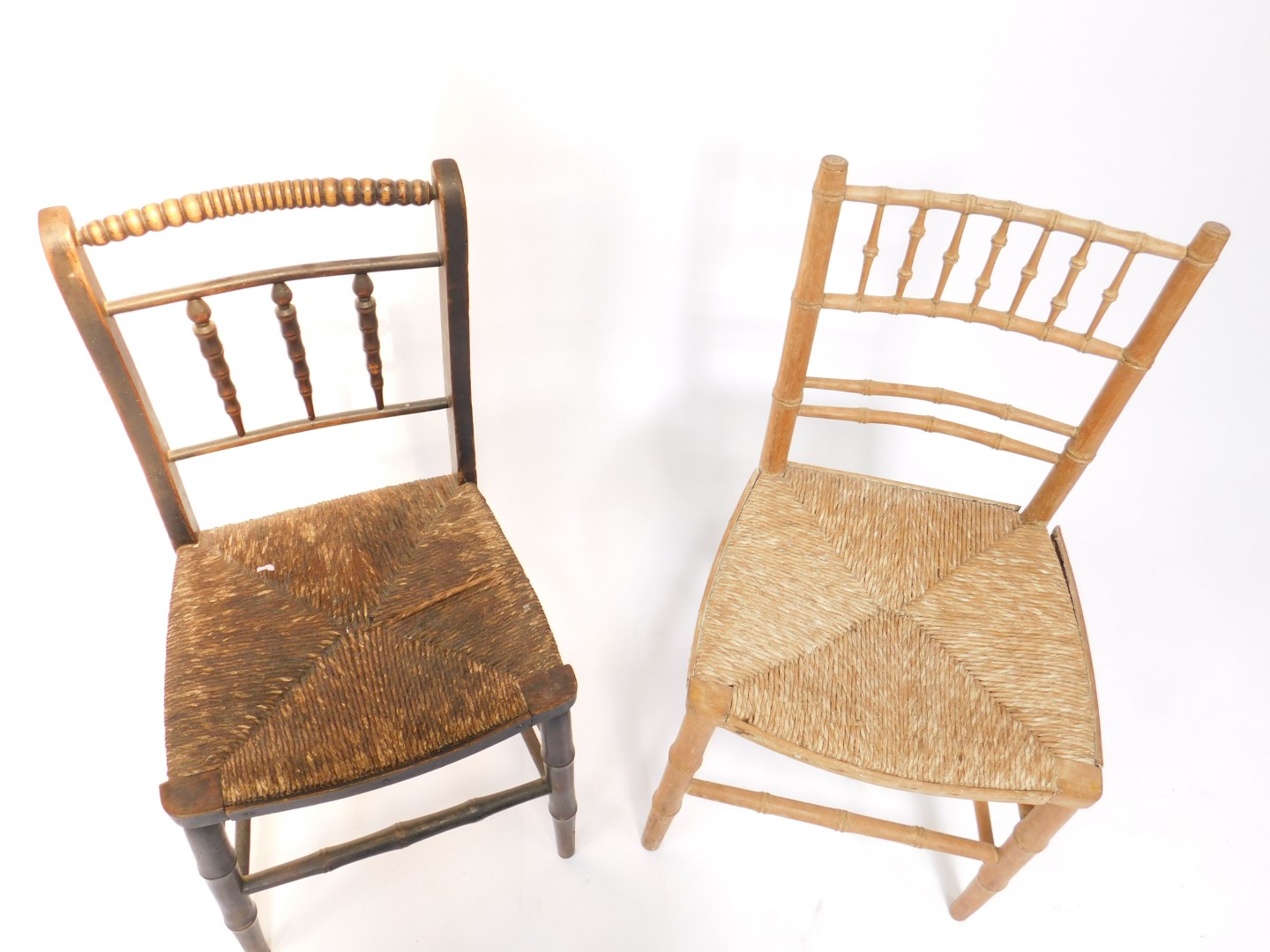 A Victorian beech and rush seated Sussex chair, together with a stripped beech and cane seated - Image 2 of 2
