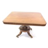 A Regency rosewood and brass inlaid tilt top breakfast table, the rectangular top with a gadrooned