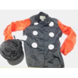 A horse racing jockey's horse racing jacket and cap, Horse Requisites Newmarket Ltd, bearing the