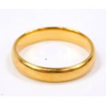 A 22ct gold wedding band, size 0, 4.8g.