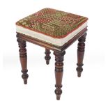A Victorian mahogany stool, with woolwork overstuffed seat, raised on turned legs, 51cm H, 38cm W,