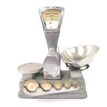A set of early 20thC Vandome & Hart grocery scales, no.4583, the base with recesses for graduated