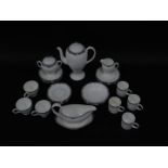 A Wedgwood porcelain part coffee service decorated in the Amhurst pattern, comprising coffee pot,