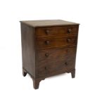 An early 19thC mahogany commode chest, with lift top and faux drawer front with knob handles and