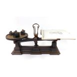 A set of Victorian cast iron Justitia Et Fides grocers scale, with a printed enamel tray, and