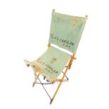A vintage pre-WWII RAF Officer's canvas beech and iron folding field chair, with carry handle and