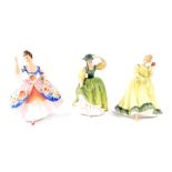 Three Royal Doulton porcelain figures, modelled as Christine HN2792, Buttercup, in green, HN2309,