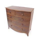 A Victorian mahogany bow front chest of drawers, with two short and three long drawers, raised on